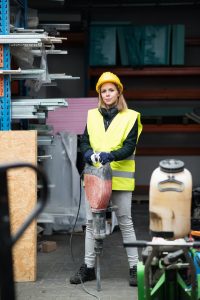 person holding jackhammer