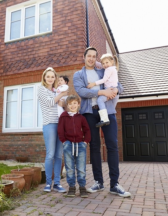 family near the house