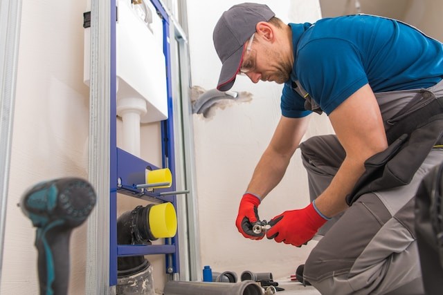 person installing water equipment