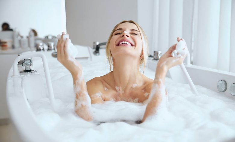person relaxing in spa tub