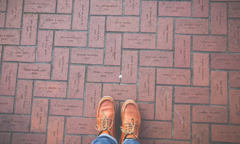 person standing on slabs