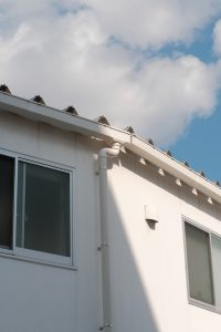white gutter on the roof
