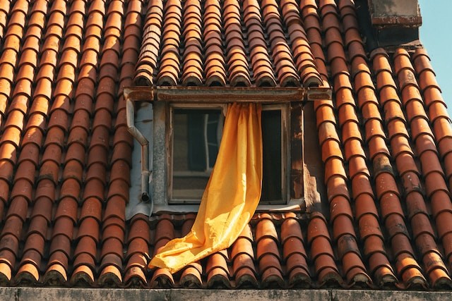 old window with gutters