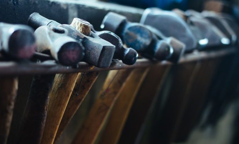 Concrete Tools - selective focus photo of black-and-brown ball-peen hammers