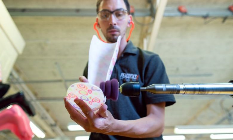 Tools Comparison - man in black polo shirt holding pink and white floral ceramic mug