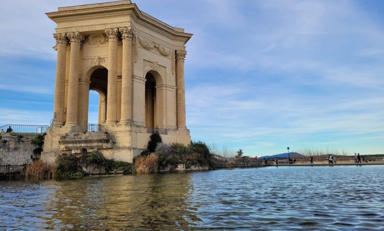 Water Usage - a large building sitting on top of a body of water