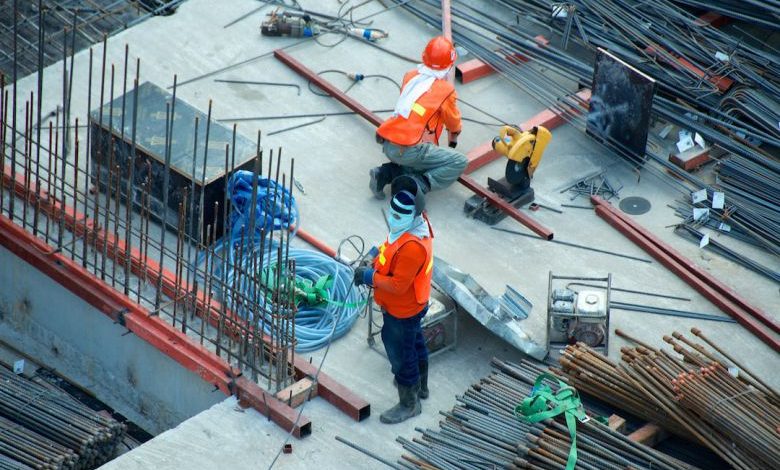 House Foundation - two men working