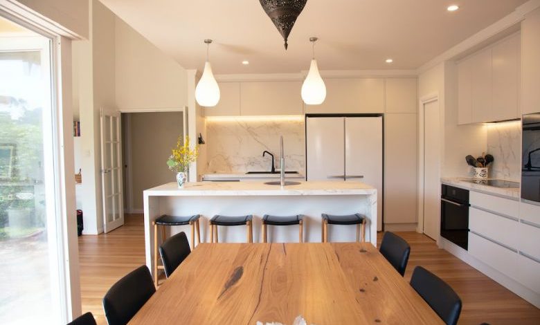 Kitchen Lighting - brown wooden table with chairs