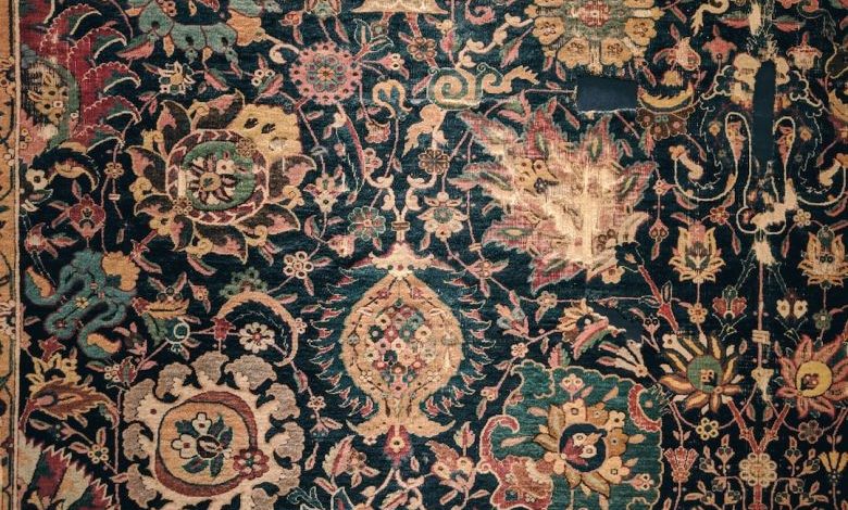 Area Rug - a large rug with many different colors and designs