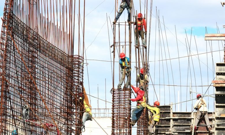 Construction Industry - people working on building during daytime