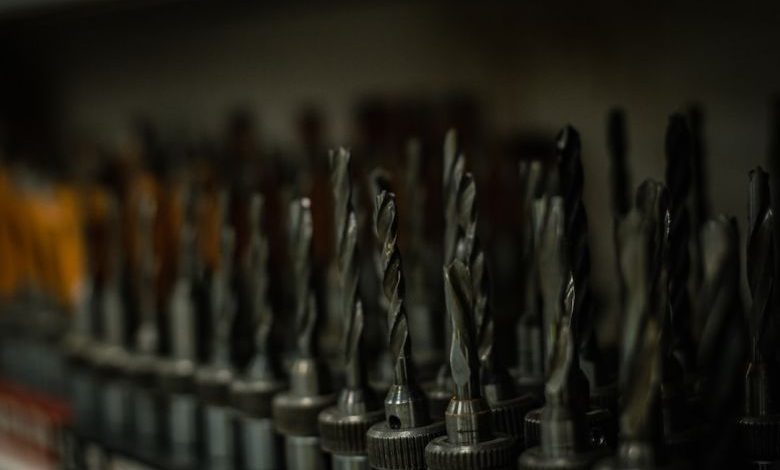 Power Drill Maintenance - a bunch of drill heads lined up in a row