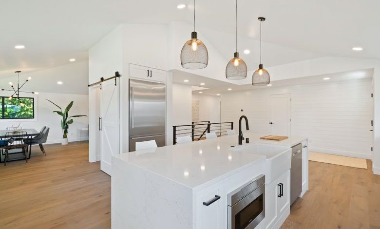 Home Renovations - turned on pendant lamps above kitchen island
