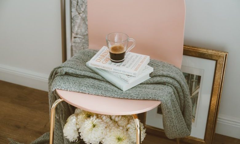 Diy Decor Ideas - clear glass mug on three stacked books inside room