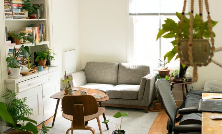 Soundproofing Home - gray fabric loveseat near brown wooden table