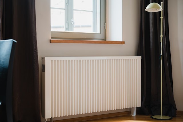 a-white-radiator-in-a-room