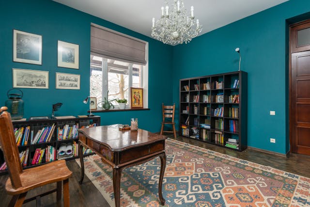 interior-of-room-with-bookshelves-and-table