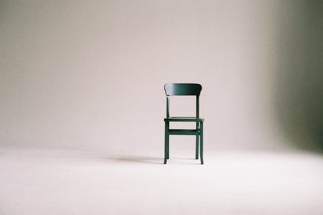 wooden-chair-on-a-white-wall-studio