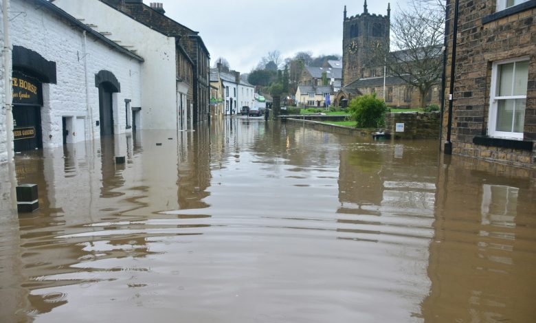 flooded-town-under-blue-sky-and-white-clouds